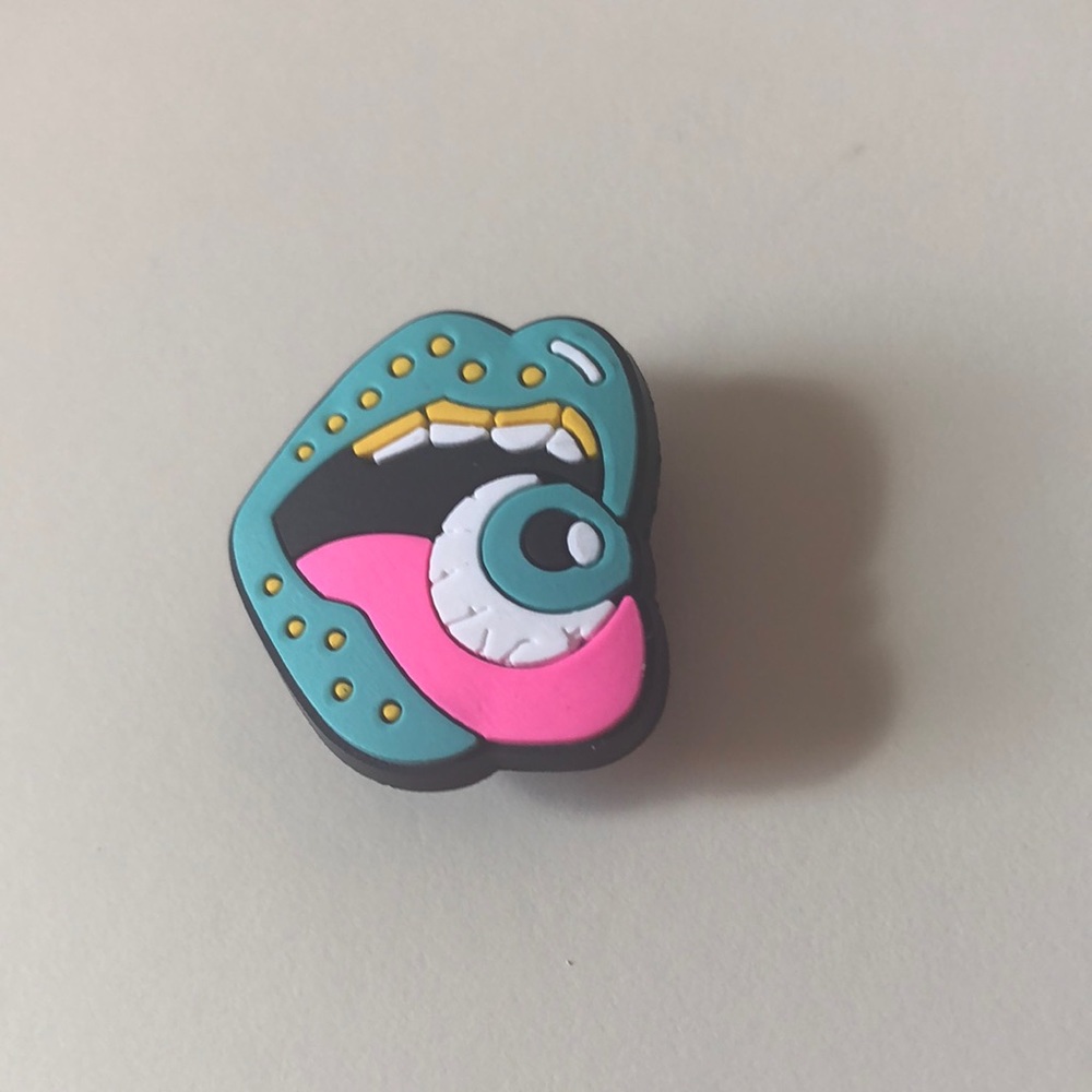 Eye in mouth croc charm